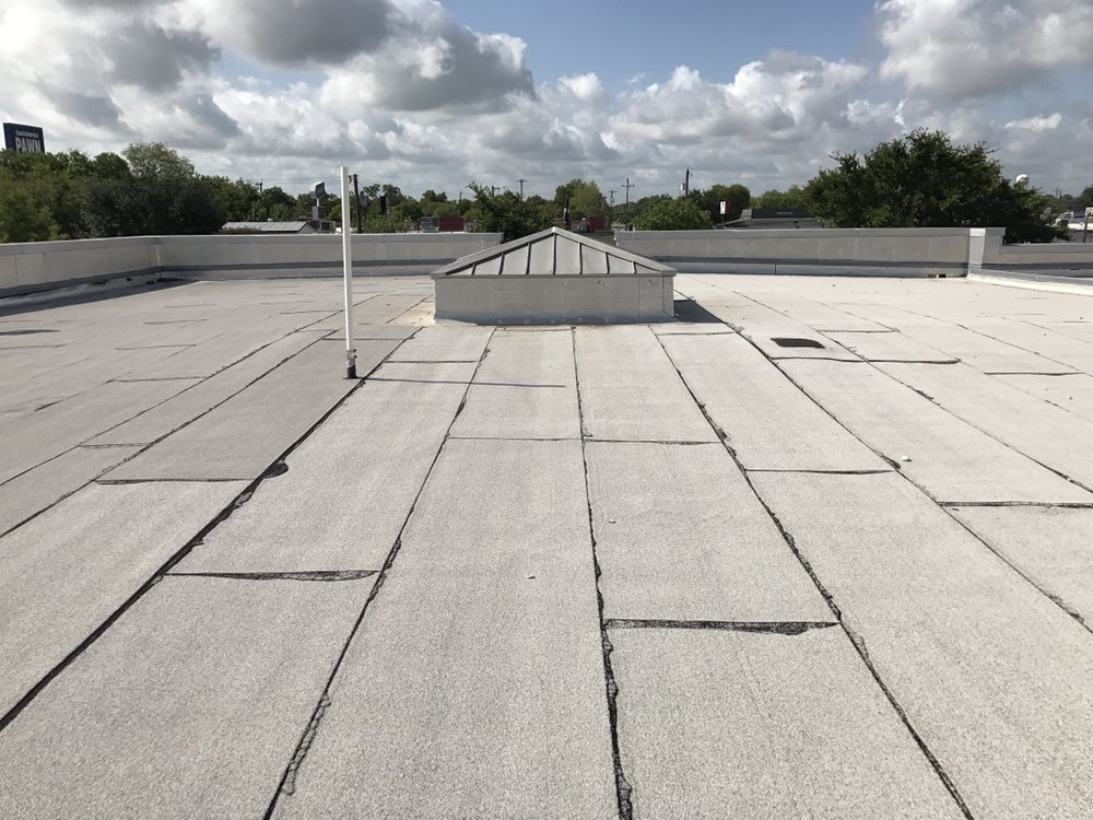 Slide of Iron Clad Roofing and Renovations