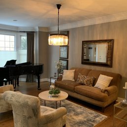 New chandelier added to room. Drilled small hole into ceiling and ran the electric to the new location on 3-way dimmer.