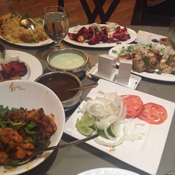 Sabri Nihari Restaurant - Frontier Chicken, Chicken Boti (red) and Mali Chicken Boti (white) and chicken biryani (far end left) - Pakistani Near Me - Chicago, Illinois