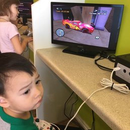 The kids get to play games while they wait for their haircut! The kids get to play games while they wait for their haircut!