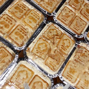 SuggaD's - a tray of waffles on a table - Soul Food Near Me - Buffalo, New York SuggaD's - a tray of waffles on a table - Soul Food Near Me - Buffalo, New York
