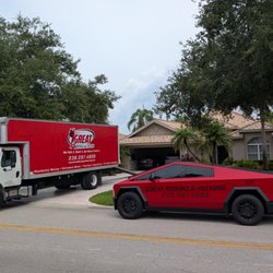 Great Moving and Packing - Picture of Moving Truck and Cybertruck