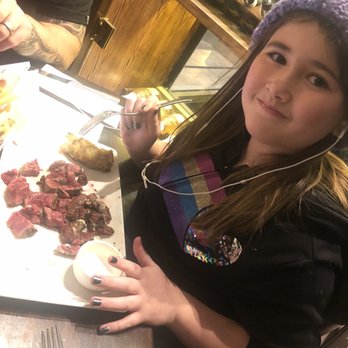 Miller & Carter - My allergy kid (she didn't die lol) eating am amazing dinner of steak. They are excellent with food allergies!!!!! - Steakhouses Near Me - Edinburgh, EDH