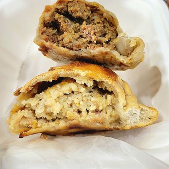 Tango Pastry - The insides of the beef empanada (top) and chicken empanada (bottom). - Bakeries Near Me - Vienna, Virginia Tango Pastry - The insides of the beef empanada (top) and chicken empanada (bottom). - Bakeries Near Me - Vienna, Virginia