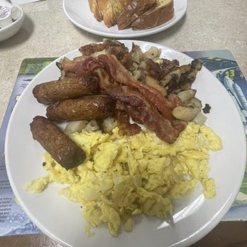 Breakfast Station - Scrambled eggs with onion, bacon, sausage, potatoes and french toast to replace the breakfast bread choice - Breakfast & Brunch Near Me - Dunnellon, Florida Breakfast Station - Scrambled eggs with onion, bacon, sausage, potatoes and french toast to replace the breakfast bread choice - Breakfast & Brunch Near Me - Dunnellon, Florida