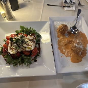 Grappa '72 Ristorante - Appetizers: burrata over arugula with tomato, arancini. Very good! - Italian Near Me - Albany, New York Grappa '72 Ristorante - Appetizers: burrata over arugula with tomato, arancini. Very good! - Italian Near Me - Albany, New York