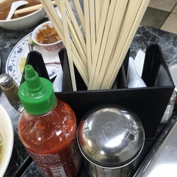 Pho 21 - Heres the menus and condiments! - Vietnamese Near Me - Houston, Texas Pho 21 - Heres the menus and condiments! - Vietnamese Near Me - Houston, Texas