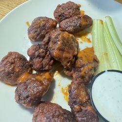 Applebee's Grill + Bar - Burnt Boneless Chicken Wings, Hard to bite into and barely Edible.