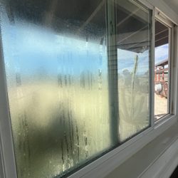 Mason Home Inspections - Moisture accumulation on window