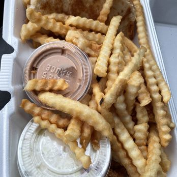 Raising Cane's Chicken Fingers - 4 pieces hiding under the fries. - Chicken Shop Near Me - Des Plaines, Illinois Raising Cane's Chicken Fingers - 4 pieces hiding under the fries. - Chicken Shop Near Me - Des Plaines, Illinois