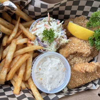 Oregon Fishmongers - Fries with coleslaw, tartar sauce, and fish with lemon and parsley. - Food Trucks Near Me - Newport, Oregon