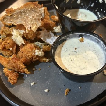Dinghy's Restaurant & Bar - Another plate of left over fish breading - American Near Me - Frankfort, Michigan Dinghy's Restaurant & Bar - Another plate of left over fish breading - American Near Me - Frankfort, Michigan