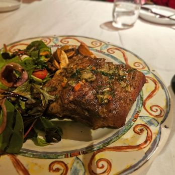 Enoteca - Costillas De Cerdito. $32 Pork Ribs. Good with some nice flavors. The highlight along with the steak. Nice side salad/potatoes also - Tapas Bars Near Me - New York, New York
