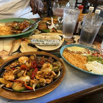 Carlos Cantina - a table full of mexican food - Mexican Near Me - Iron Mountain, Michigan Carlos Cantina - a table full of mexican food - Mexican Near Me - Iron Mountain, Michigan