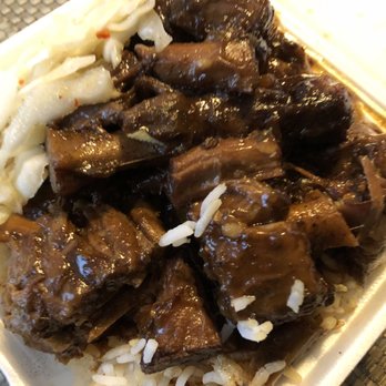 Randy's Jamaican Patties - Small oxtail with rice and coleslaw. - Caribbean Near Me - York, Ontario