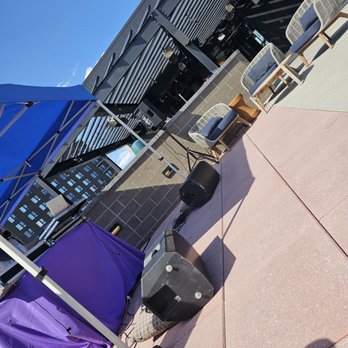 Rook - Outdoor DJ booth during Brunch spinning House music classics - Bars Near Me - Denver, Colorado
