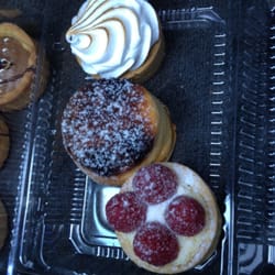 The Rolling Pin Bakery and Patisserie - Raspberry tart, blueberry cheesecake and the cutest lemon meringue pie.