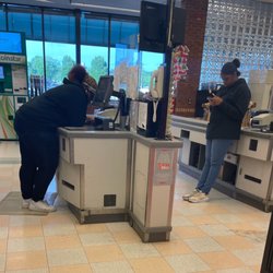 Ingles Markets - Two Associates on their phone, on a busy Sunday. Not a care in the world!!