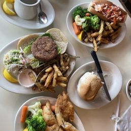 Crab Cake Sandwich Platter, Hot Buttered Lobster Roll Platter, and halibut fish Crab Cake Sandwich Platter, Hot Buttered Lobster Roll Platter, and halibut fish