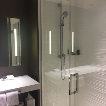 AC Hotel Irvine - Spacious shower with massage option feels great on sore shoulders - Hotels Near Me - Irvine, California