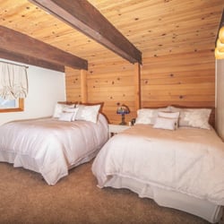 Country Club Chalet - Second bedroom with brand new carpeting, 1 Queen and 1 Full pillow top bed. Brand new flat screen TVs and plush linens.