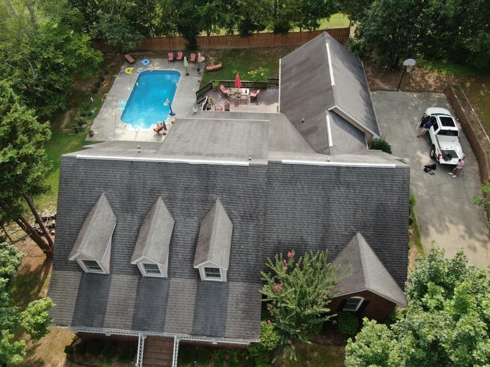 Slide of AMI Roofing