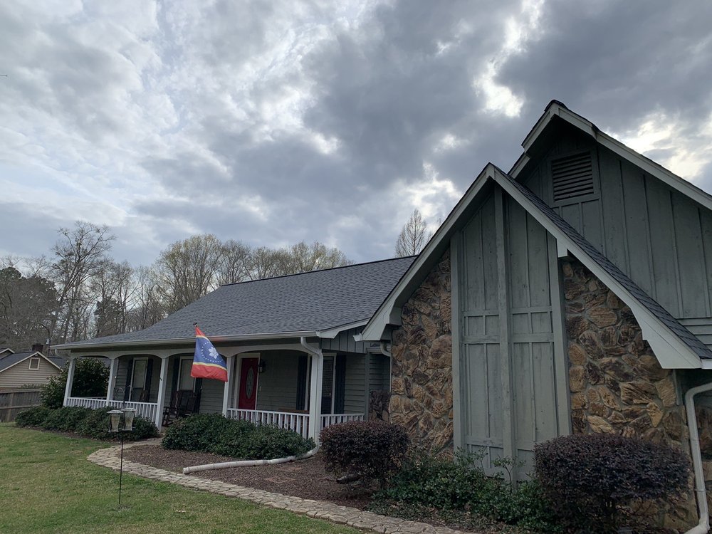 Slide of Martin Roofing