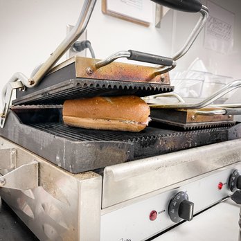 TopZ Sandwich Company - a hot dog on a grill - Sandwiches Near Me - Billings, Montana TopZ Sandwich Company - a hot dog on a grill - Sandwiches Near Me - Billings, Montana