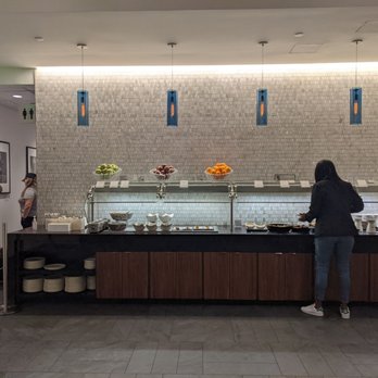 American Express Centurion Lounge - Buffet layout. - Airport Lounges Near Me - Houston, Texas American Express Centurion Lounge - Buffet layout. - Airport Lounges Near Me - Houston, Texas
