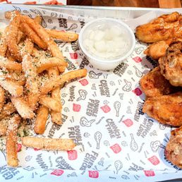 6 piece Wings with Garlic Soy sauce, seasoned (Parmesan) french fries served with pickled radish 6 piece Wings with Garlic Soy sauce, seasoned (Parmesan) french fries served with pickled radish