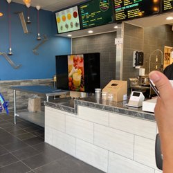 Boba King - Front store. Checkout. Flavored Milk Tea Menu. Topping Menu