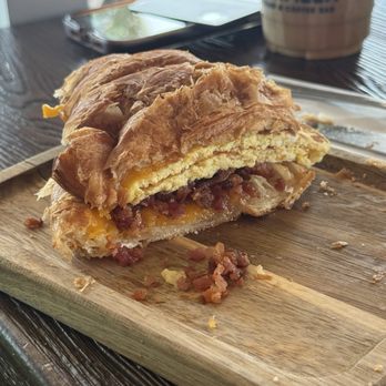 Carmela Coffee - Westlake - Croissant breakfast sandwich. Bacon egg and cheddar. - Coffee Roasteries Near Me - Westlake, Florida