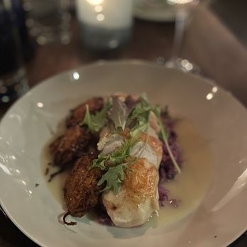 Merchant - Crispy skin chicken breast w/ house made red Napa cabbage, sauerkraut, sweet potato fritters and veloute.  ##Cheapdatenight - Cocktail Bars Near Me - Madison, Wisconsin