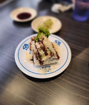 Kura Revolving Sushi Bar by null