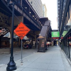 The El - Views of the elevated tracks and station stairs from the surface streets.