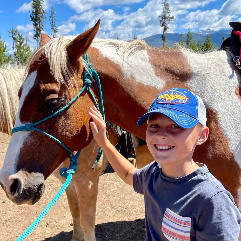 Winter Park Trail Rides - Texas took good care of his beginner rider. - Horseback Riding Near Me
