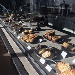 Slow Hand Coffee  Bakeshop - Bakery counter. Scones, muffins, cookies, quick breads. Baked goods for purchase for Thanksgiving too!