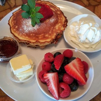 Cafe' Sole' - Very Berry Pancakes with maple syrup and whipped cream and butter. - Seafood Near Me - Jupiter, Florida