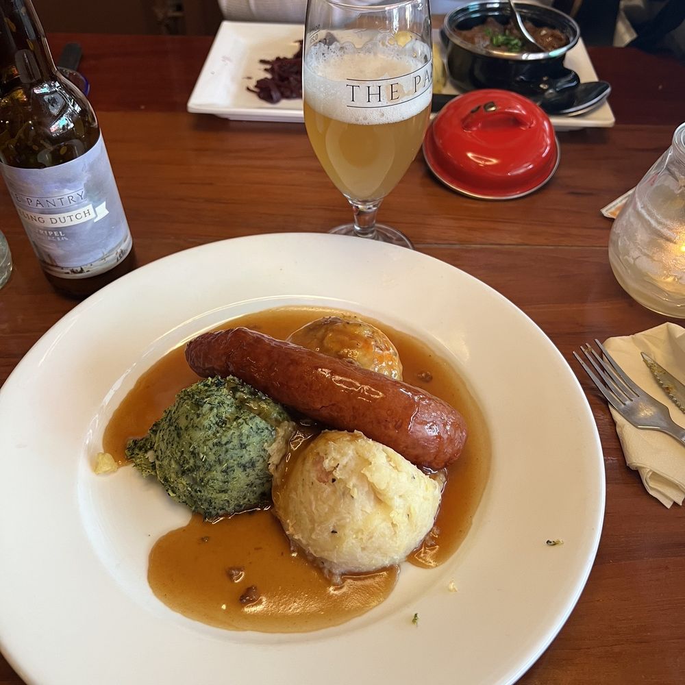 The Pantry - Combination hutspot, zuurkoolstamppot, boerenkoolstamppot with sausage and the house made trippel - Modern European Near Me - Amsterdam, New Hampshire The Pantry - Combination hutspot, zuurkoolstamppot, boerenkoolstamppot with sausage and the house made trippel - Modern European Near Me - Amsterdam, New Hampshire