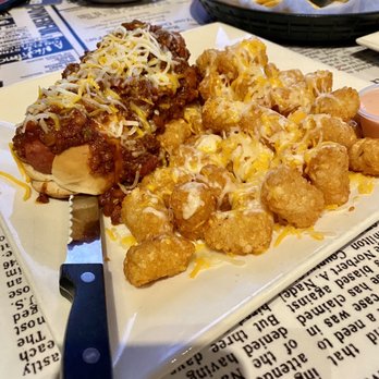 Legends Sports Pub - Tater tots with cheese and my Chilli Hotdog. - Pizza Near Me - Sandy, Utah Legends Sports Pub - Tater tots with cheese and my Chilli Hotdog. - Pizza Near Me - Sandy, Utah