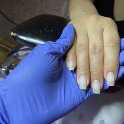 Healthy nails using structured gel manicure techniques after filing off gel Polish