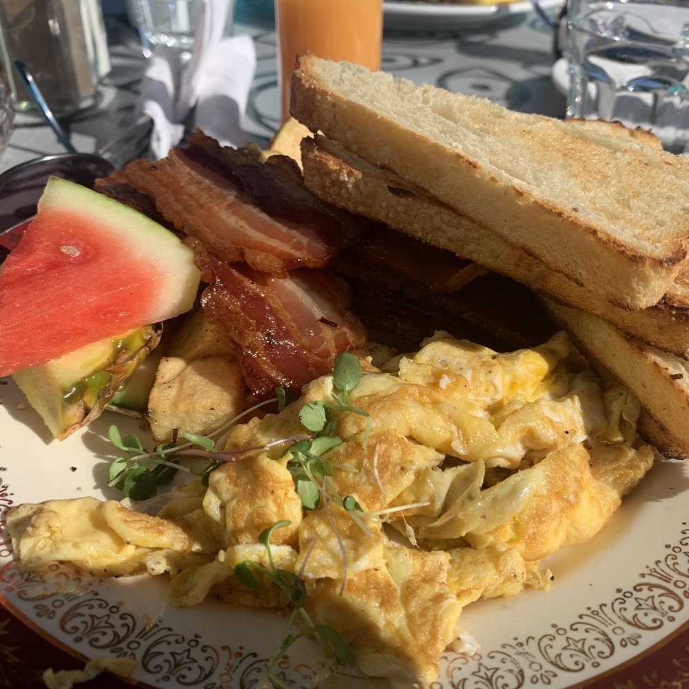Off Main - an omelet, bacon, watermelon, and toast - Breakfast & Brunch Near Me - Courtenay, British Columbia Off Main - an omelet, bacon, watermelon, and toast - Breakfast & Brunch Near Me - Courtenay, British Columbia