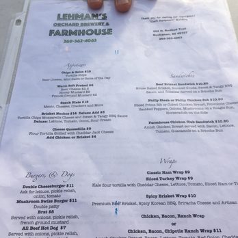 Lehmans Farmhouse - a hand holding a menu - Breweries Near Me - Buchanan, Michigan