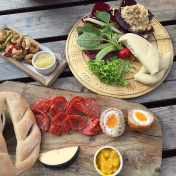 The Oast House - Deli board with chorizo, cheese, scotched egg and piccalilli. Hummus board and pork scratchings! - Pubs Near Me - Manchester, XGM