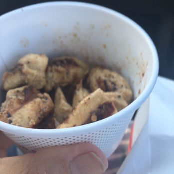 Chick-fil-A - ows a person holding a bowl of food - Fast Food Near Me - Frisco, Texas