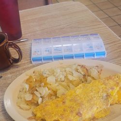 Gas Grill Family Restaurant - Ham and cheese omelette home fries toast out of the picture white coffee Just under 11.25 11/17/2024
