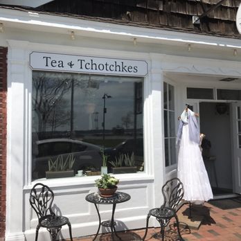Tea and Tchotchkes - a dress hanging outside of a shop - Coffee & Tea Near Me - Greenport, New York Tea and Tchotchkes - a dress hanging outside of a shop - Coffee & Tea Near Me - Greenport, New York