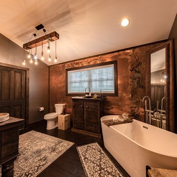 Perez Design Build Remodel - a bathroom with a bathtub, sink, and toilet - General Contractors Near Me - Clarks Summit, Pennsylvania Perez Design Build Remodel - a bathroom with a bathtub, sink, and toilet - General Contractors Near Me - Clarks Summit, Pennsylvania