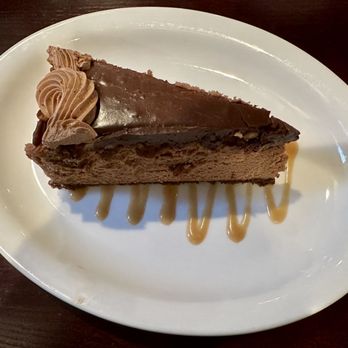 Academy Street Bistro - For dessert, the featured cheesecake (Chocolate Bourbon Pecan). - New American Near Me - Cary, North Carolina Academy Street Bistro - For dessert, the featured cheesecake (Chocolate Bourbon Pecan). - New American Near Me - Cary, North Carolina