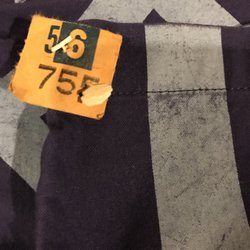 Beal's Cleaners & Laundromat - Burned fabric conveniently located next to their dry cleaning tag